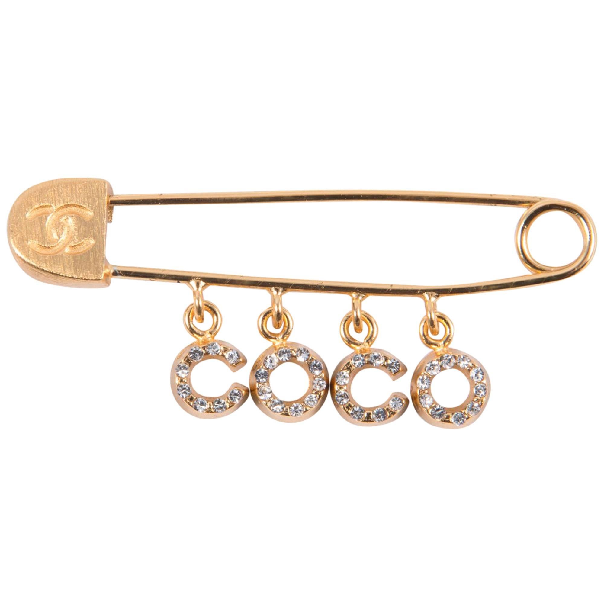 2001s Chanel Coco Strass and Gold Tone Brooch Safety Pin 