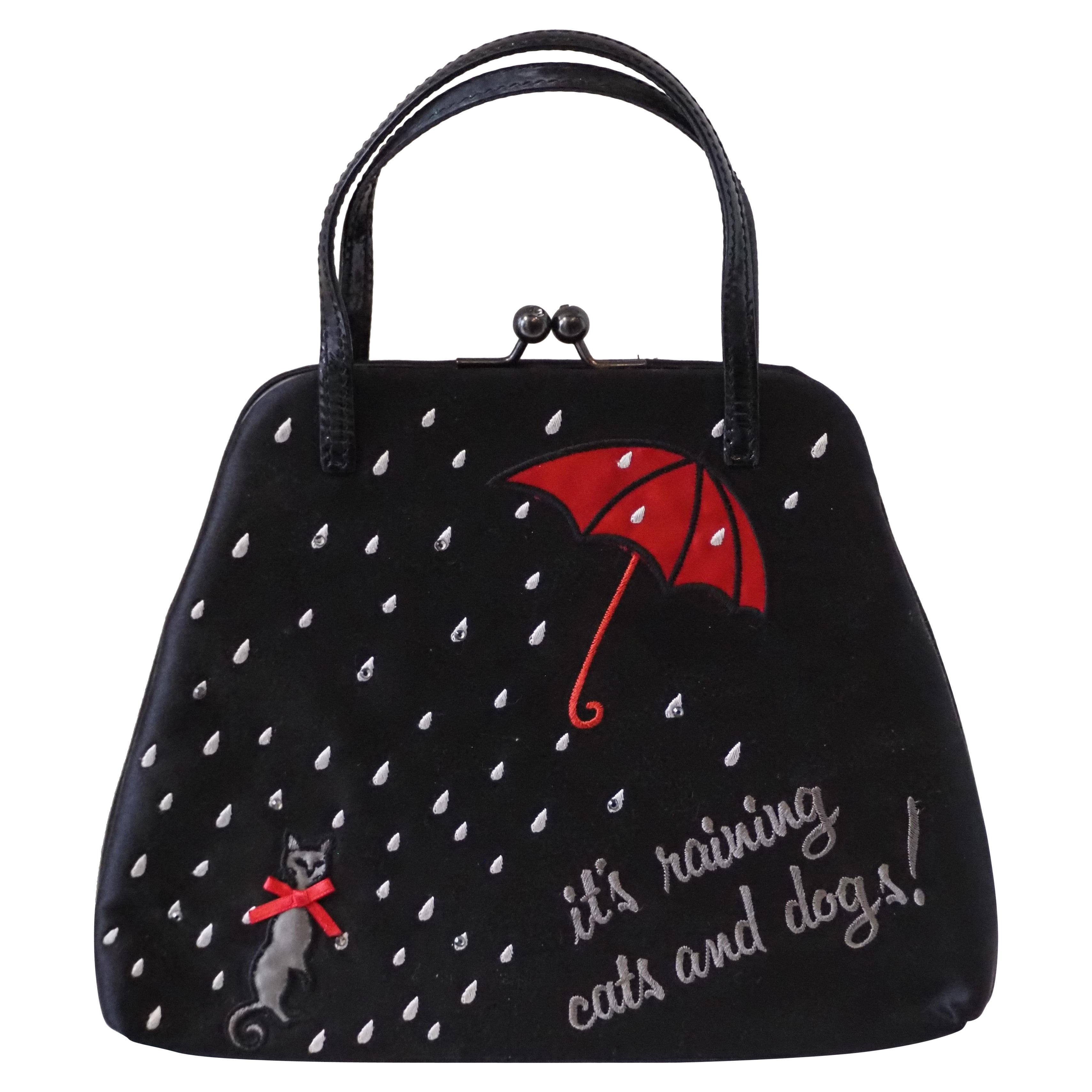 Moschino "it's raining cats and dogs" Handle bag