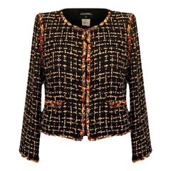 Giacca Chanel in tweed con nastro nero da 14 carati e accenti Jewell 38 FR