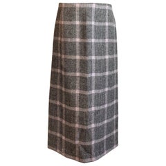 Gucci Tweed skirt in shades of black that looks almost gray and pink lilac with