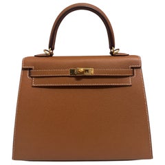 Hermes Kelly 25 oro con finiture in oro come nuovo