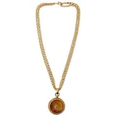 Used Gianni Versace 1990's gold tone medusa head pendant 