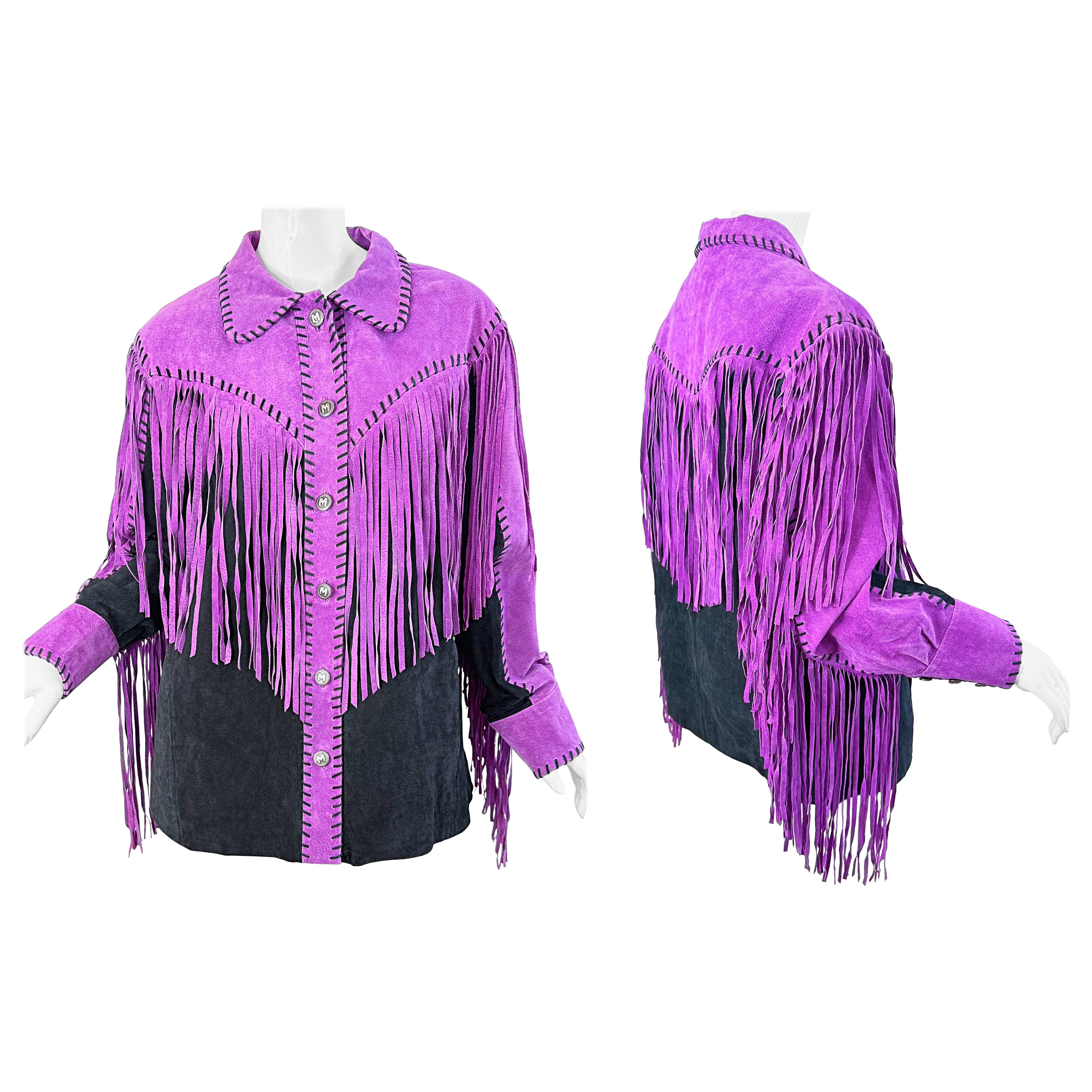 Who designed Cher’s clothes?