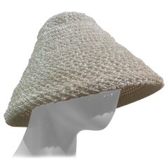 Vintage 1960 White Straw Tiki-Style Sun Hat in a Simple Conical Shape.