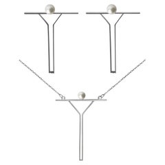 Pendentif contemporain minimaliste en forme de perle sur chaîne et boucles d'oreilles en argent 925