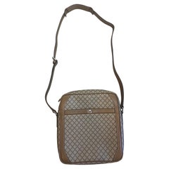 Bolso satchel Gucci de lona encerada con estampado de diamantes de Frida Giannini.
