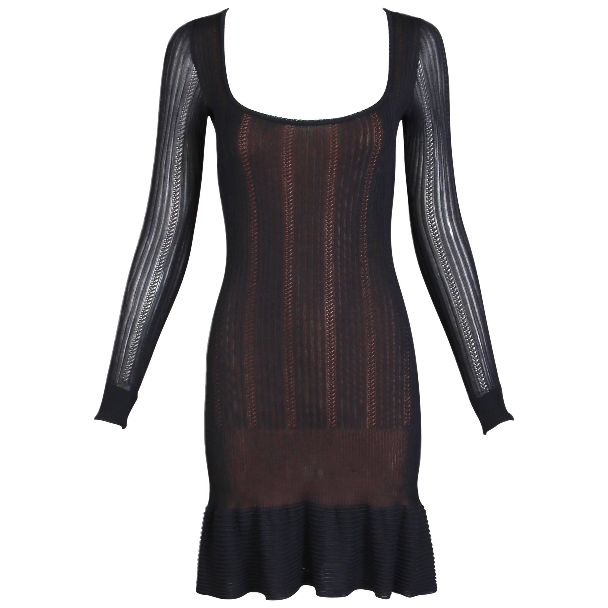 Alaia Black Sheer Stretch Viscose Long Sleeved Mini Dress W/Flounced Hem For Sale