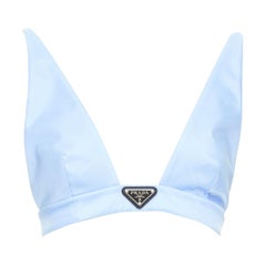 PRADA Re- Nylon bustier bleu clair avec logo triangulaire et décolleté plongeant, taille IT 38 XS