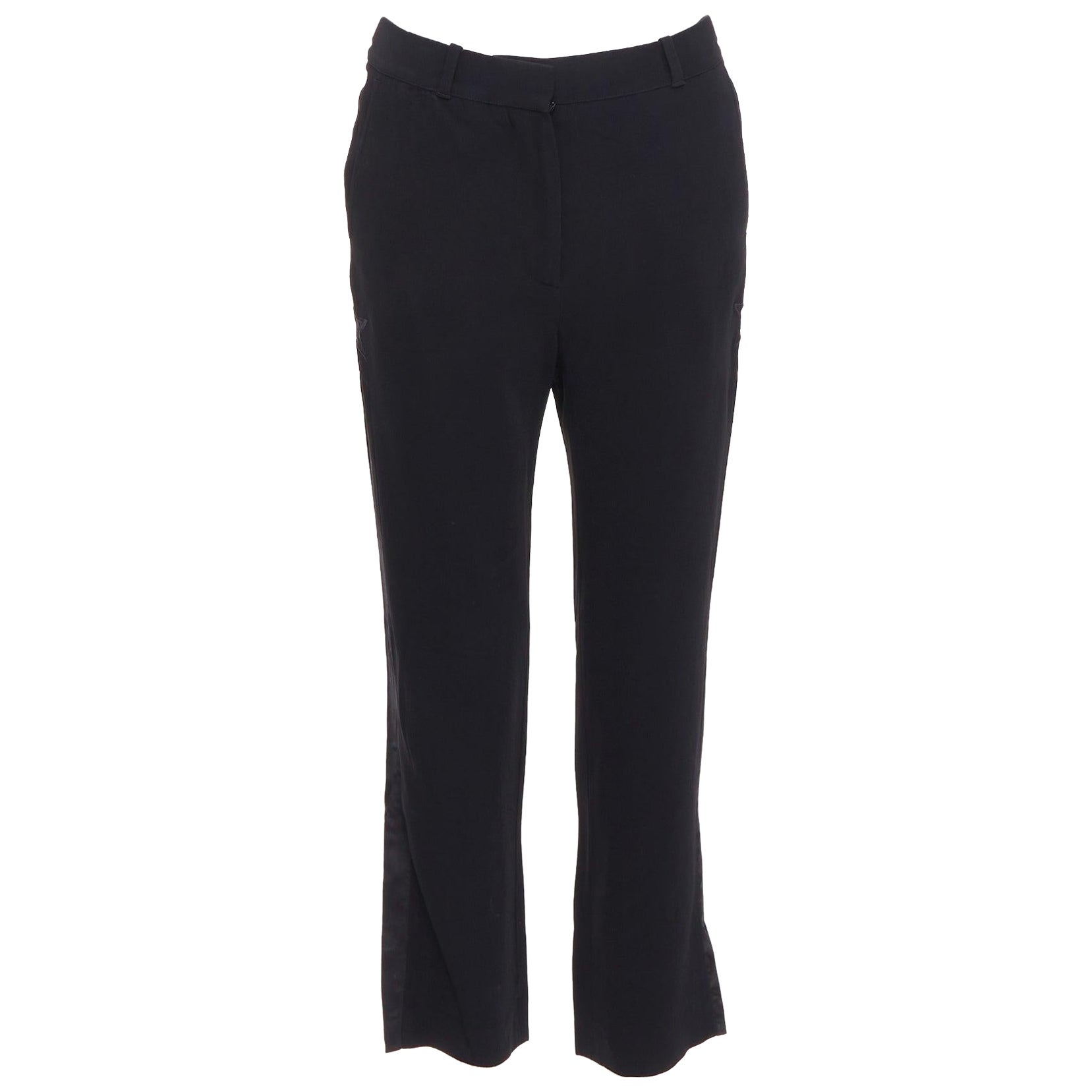 GIVENCHY - Pantaloni svasati neri con stelle applicate in seta FR34 XS
