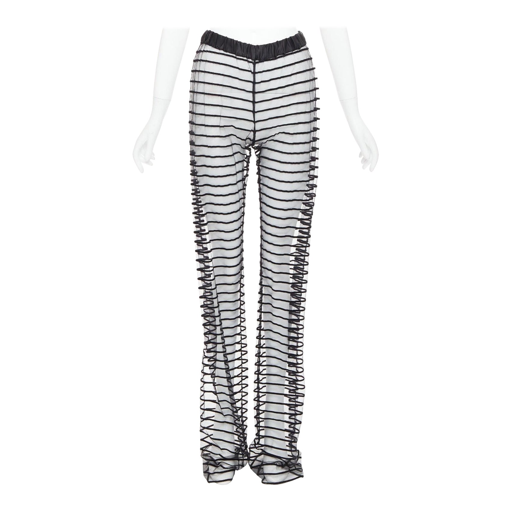 DRIES VAN NOTEN pantaloni a gamba tesa in rete floccata nera a righe FR38 M in vendita