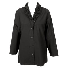 Giacca ISSEY MIYAKE nera in lana e cashmere del 1990 con collo "origami".