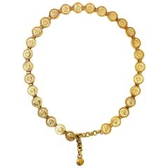 Gianni Versace gold plated and mother of pearl medusa head belt, 1990s