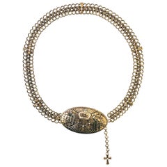 1990s Versace chain belt with a large oval buckle