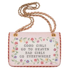 Moschino „Good Girls Go to Heaven, Bad Girls Go Everywhere“ Nadelspitze-Klappentasche