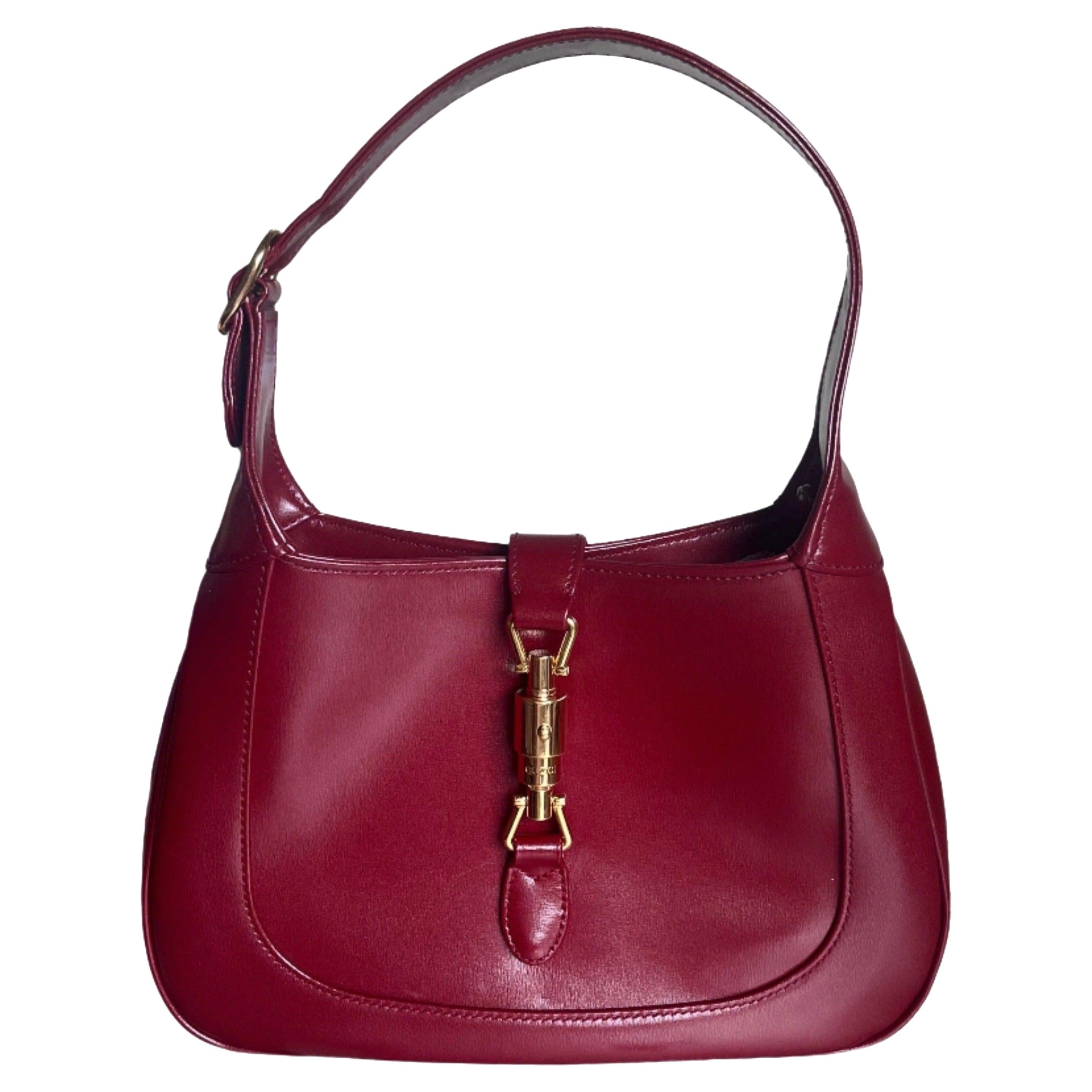 Gucci Jackie 1961 - Petit sac en cuir rouge bourgogne avec sangle et serrure Piston dorée