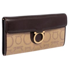 Salvatore Ferragamo Billetera continental de lona y piel Gancini beige/marrón