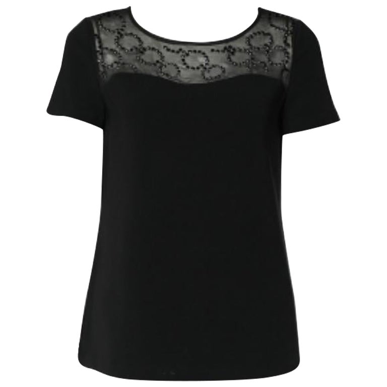 Diane von Furstenberg Top negro de crepé con detalle de cuello embellecido S