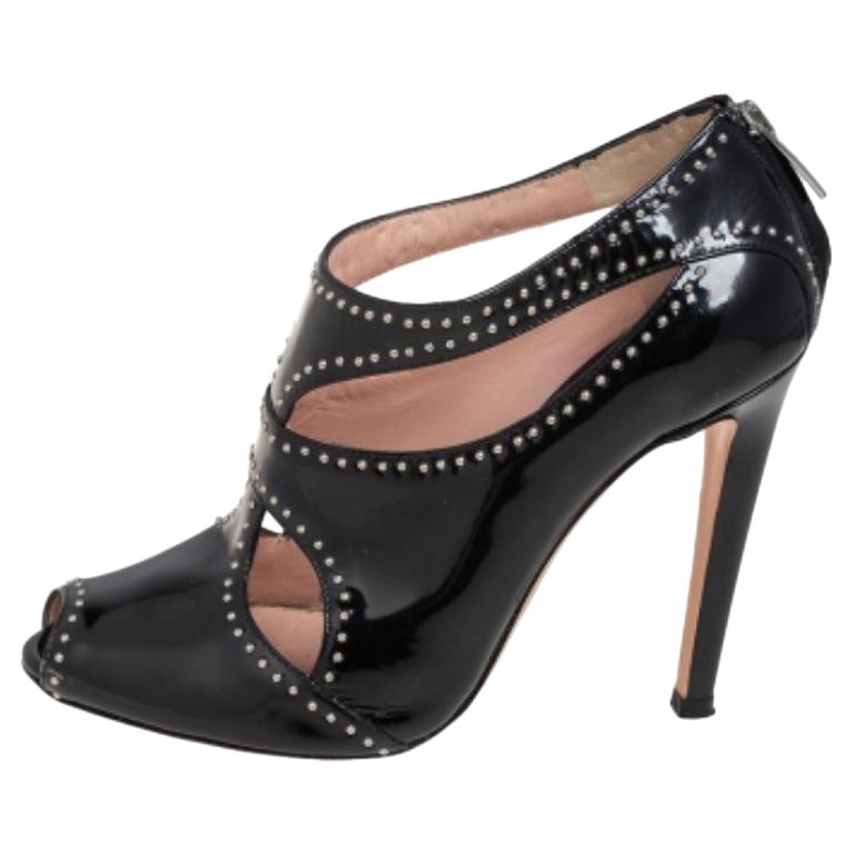 Gianvito Rossi Botines de charol negro con tachuelas Talla 37