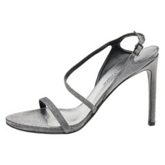 Stuart Weitzman - Sandali con cinturino alla caviglia in glitter grigio metallizzato misura 41