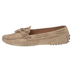 Mocassini con fiocco in tela oro metallizzato Tod's taglia 42