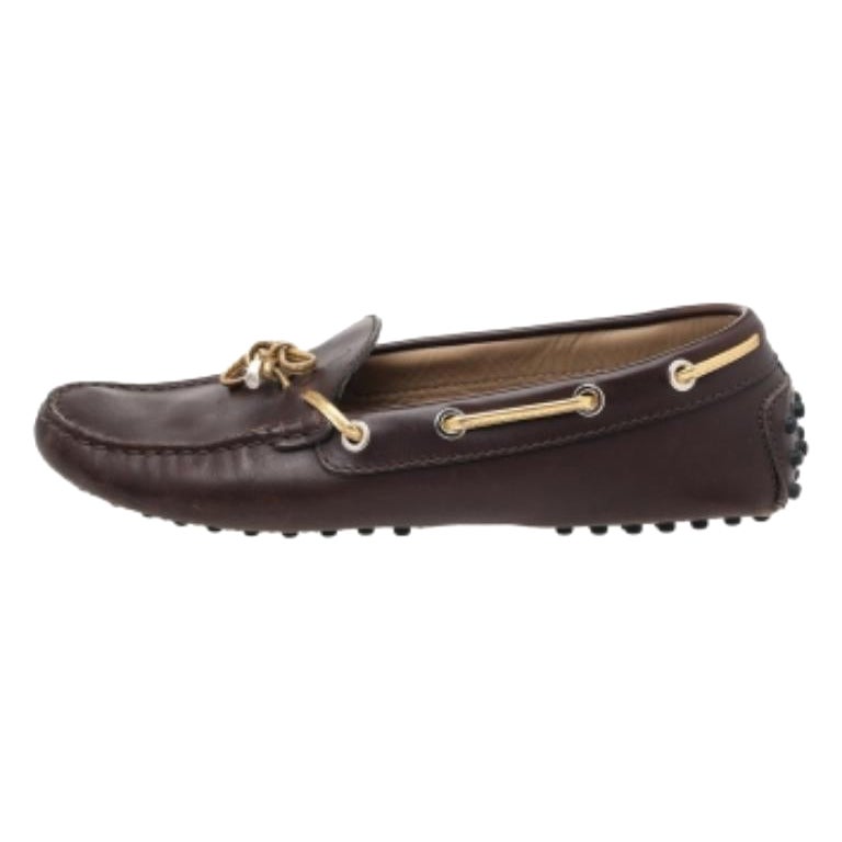 Mocassini con fiocco in pelle marrone/oro di Tod's Taglia 37
