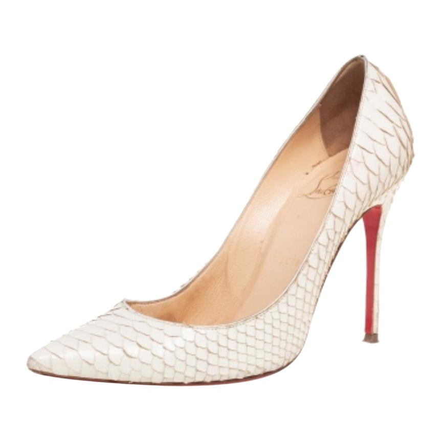 One of Christian Louboutin's most loved styles is So Kate—named after English model and businesswoman, Kate Moss. These white So Kate pumps are rendered in python leather, flaunting well-cut vamps, pointed toes, and high stiletto heels that create a
