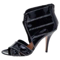 Givenchy Botines de charol negro con corte a rayas Talla 39.5