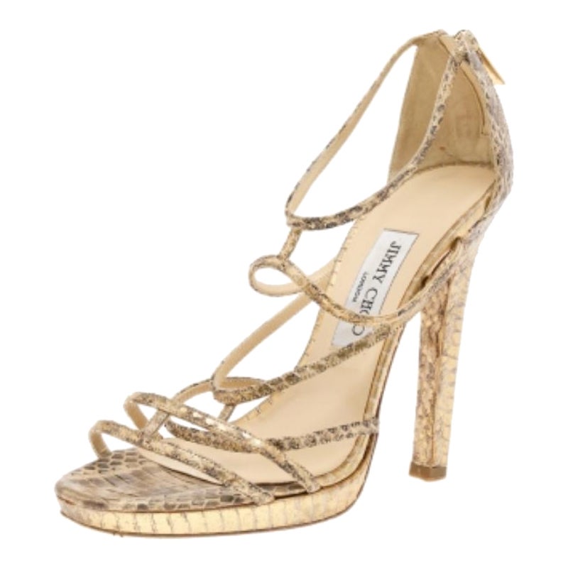 Jimmy Choo Sandalias de tiras de piel dorada/beige metalizadas talla 39
