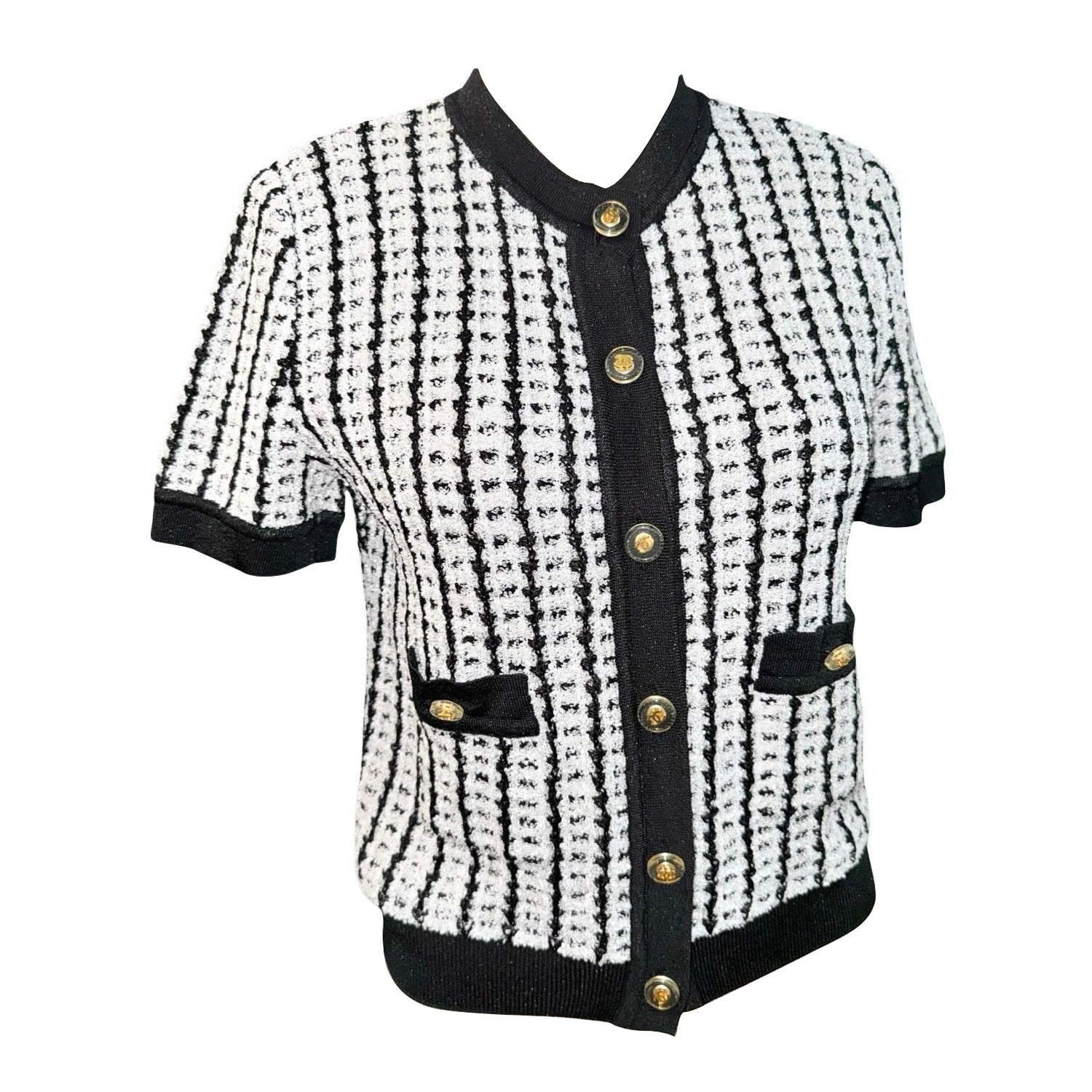 Veste cardigan à manches courtes en tweed noir et blanc de Chanel