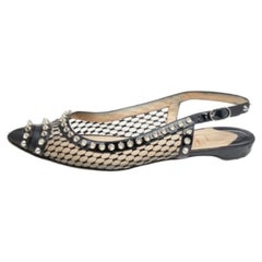 Christian Louboutin Sandales plates à picots en cuir et maille noirs Taille 37