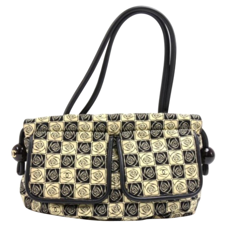 Chanel Schwarze und beige camellia Umhängetasche aus Segeltuch