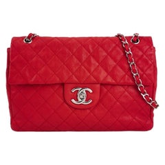 Chanel Classic Flap Maxi rouge caviar cuir métallique argenté logo CC géant