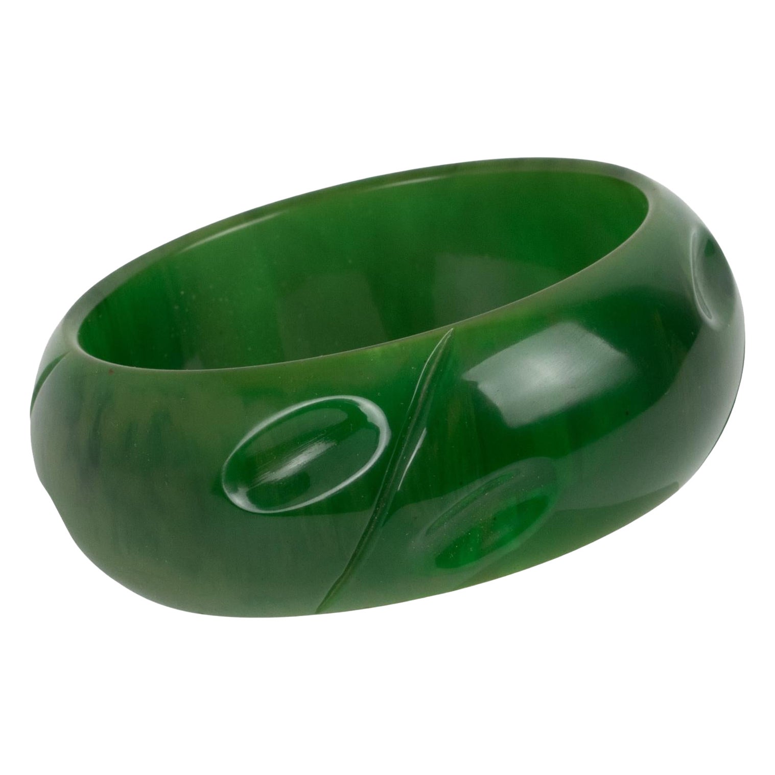 Bracciale in bachelite con vortici di spinaci intagliati