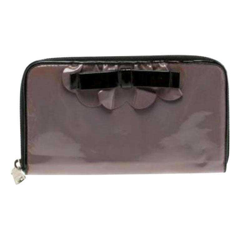 Portafoglio con zip in pelle verniciata lilla Miu Miu