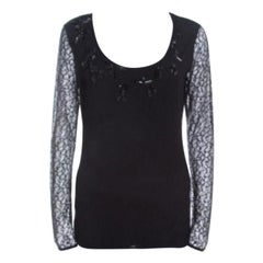 Escada Top nero in jersey con pizzo e cristalli impreziosito dal collo alto di Erbrou S