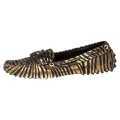 Mocassini con fiocco in pelle nera e oro metallizzato Tod's misura 38,5