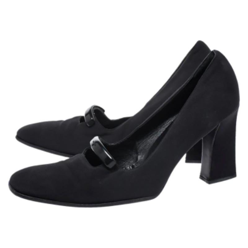 Put your best foot forward in this exclusive pair of pumps from Prada. These pumps are made from fabric to reflect classic style in a durable manner. They are elevated on block heels. Don these black pumps with both formal and casual wear.