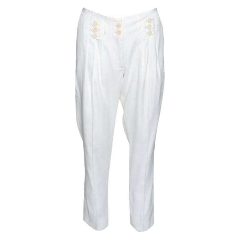 Stella McCartney Pantalones cónicos de seda recubierta color crema con detalle de botones S en venta