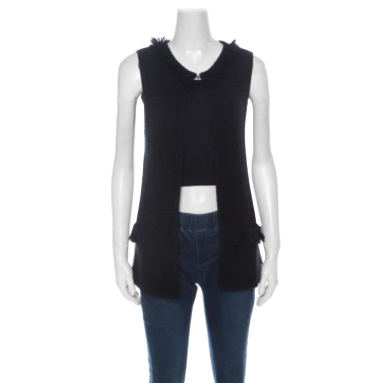 CH Carolina Herrera Schwarzer Grobstrick Merinowolle mit Fransen ärmellose Strickjacke XS im Angebot
