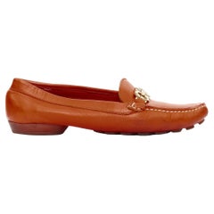 Used SALVATORE FERRAGAMO burnt orange leather gold logo buckle loafers 6.5