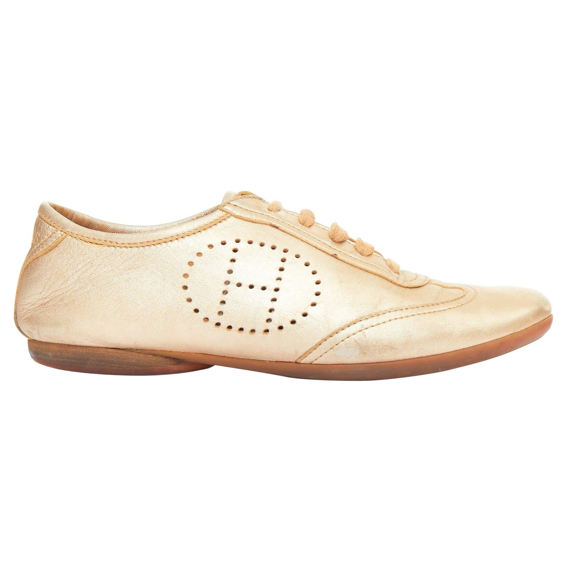 HERMES Pewter gold metallic perforated H leather laced flat sneakers EU37 im Angebot