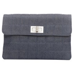 CHANEL Mademoiselle Chocolate Bar denim blue quilted clutch bag