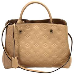 Louis Vuitton White Monogram Empreinte Montaigne MM Leather ref