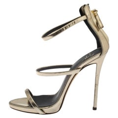 Giuseppe Zanotti Sandali con cinturino Harmony in pelle laminata oro misura 35