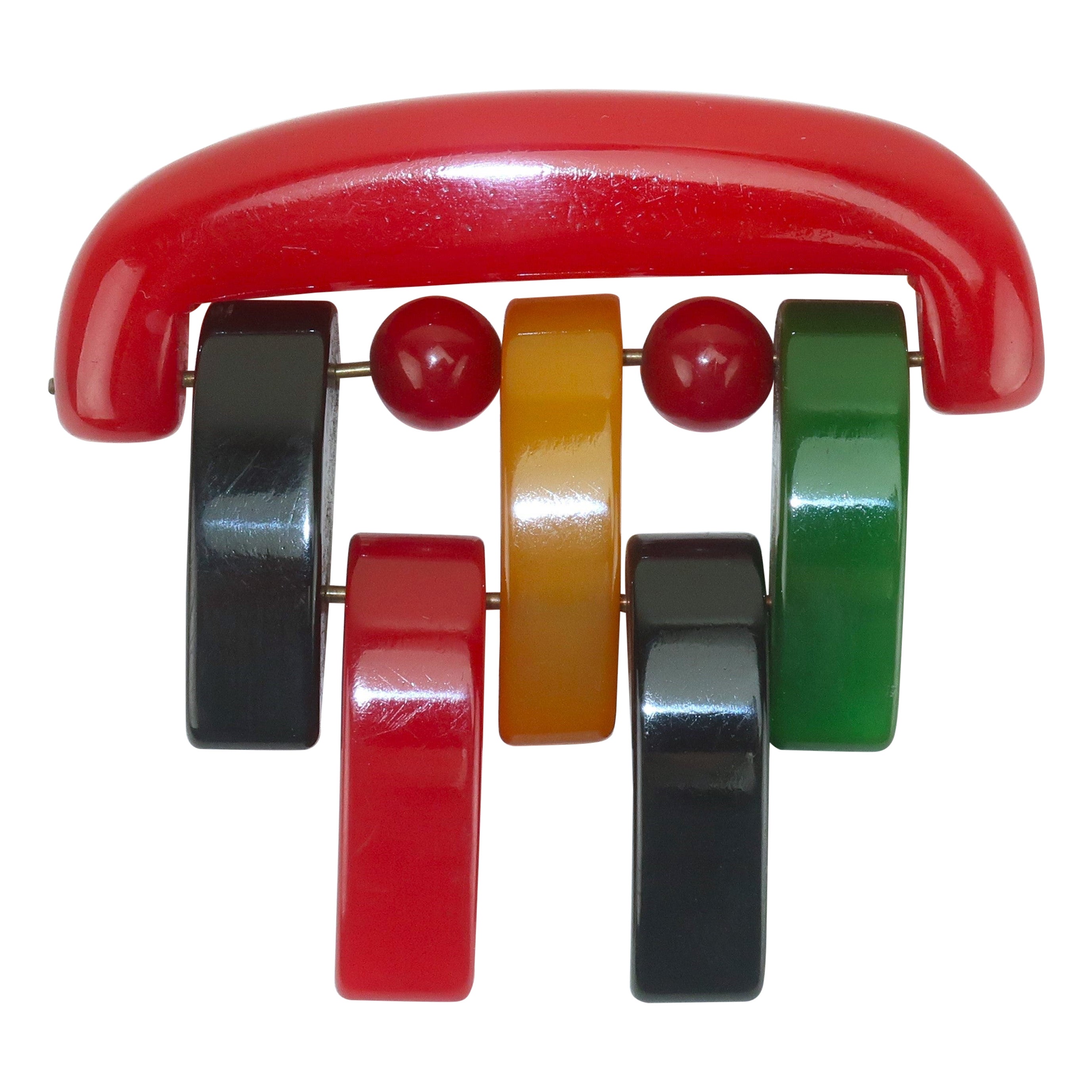Broche en bakélite de style Philadelphie, articulée et multicolore, C.1940 en vente