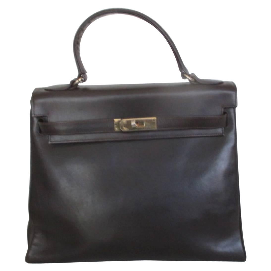 brown vintage leather bag with gold hardware