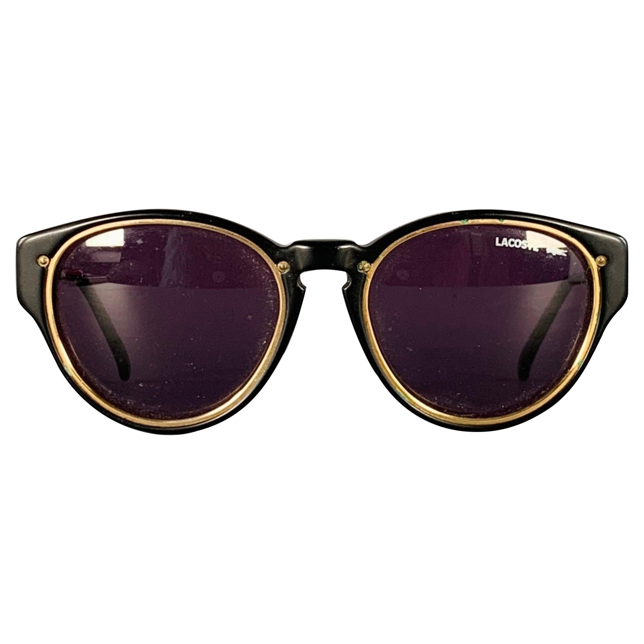 LACOSTE Schwarzgold Acetat Runde Sonnenbrille im Angebot