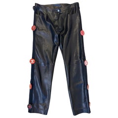 Chanel black pants with pins.