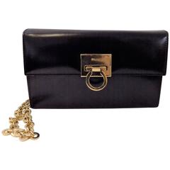  Salvatore Ferragamo black polished clutch / shoulder bag w gold chain