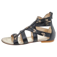 Roberto Cavalli Schwarze Sandalen aus Leder mit Verzierungen Größe 35